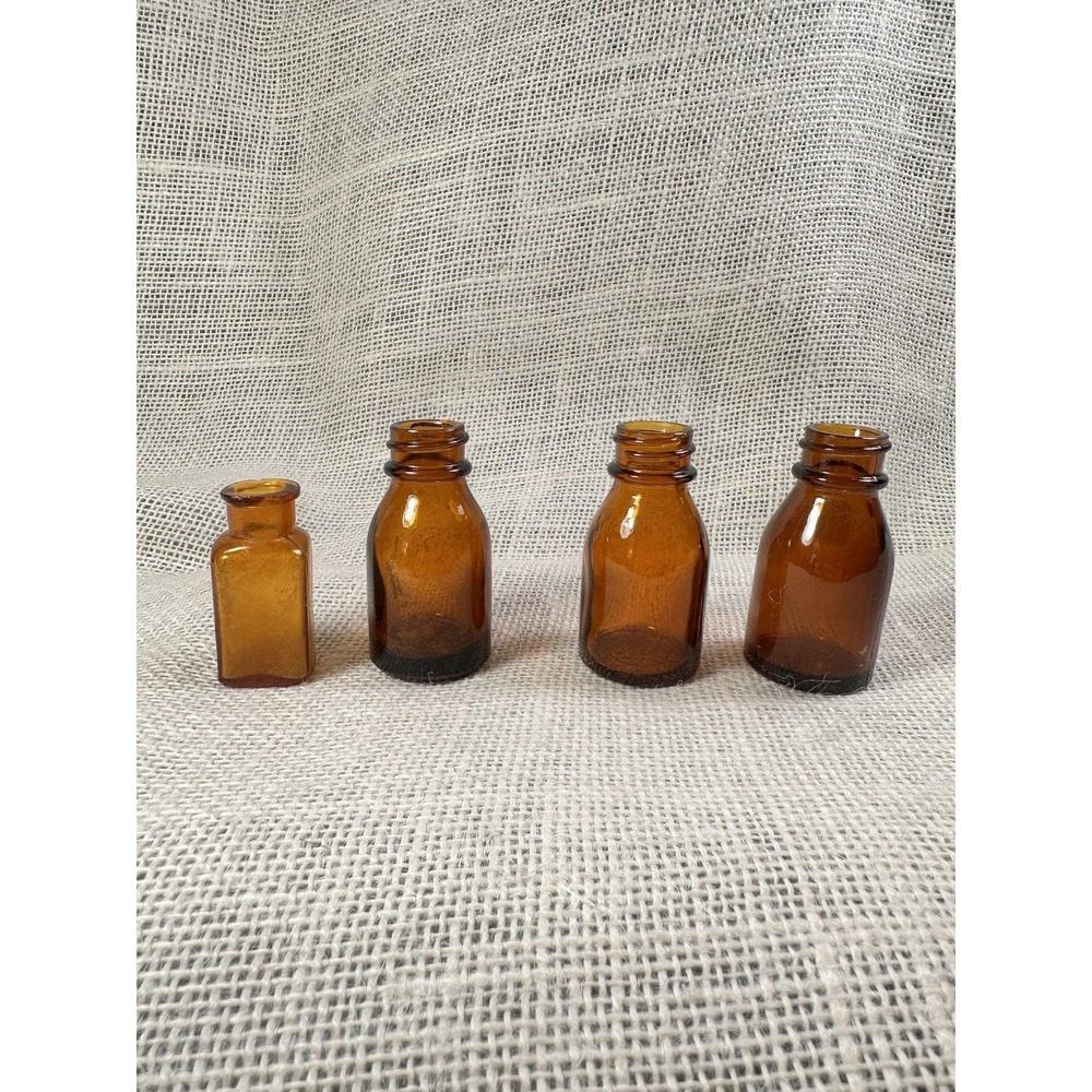 Vintage Vicks Va-Tro-Nol amber bottles Lot (3) and One Random Brown Bottle